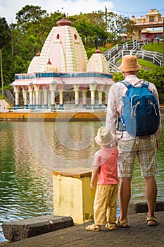 Father and child at Ganga Talao. Mauritius. photo