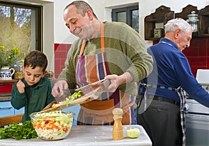Father child and grandfather cooking