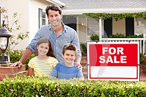 Father and children outside home