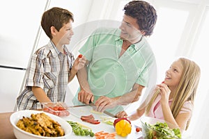 Father And Children Prepare A meal