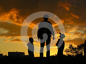 Father with children sunset 2