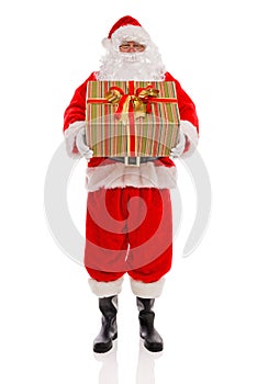 Father Christmas holding a gift wrapped present