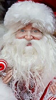 Father Christmas mannequin looking joyous and smiling