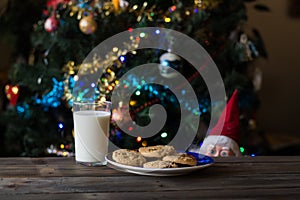 Father Christmas toy, cookies and glass of milk