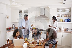 Father Concerned With Excessive Use Of Technology By Family photo