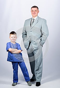 Father and cute small son. Child care development upbringing. Respectable profession. Man respectable businessman and