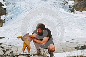 Father and daughter baby traveling in mountains