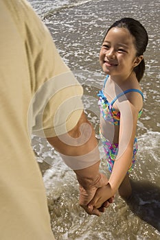 Father And Daughter On Beach