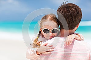 Father and daughter at beach