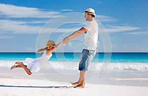 Father and daughter at beach