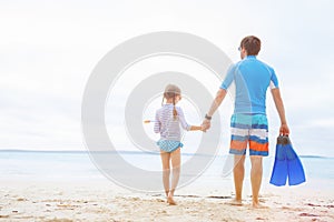 Father and daughter at beach