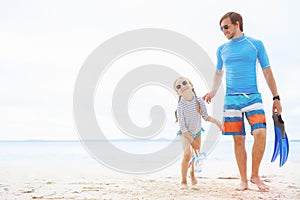 Father and daughter at beach