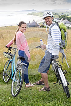 Father and Daughter on bikes