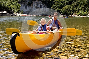 Father and daughter in canoe