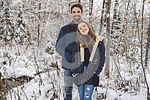 Father and daughter on forest in winter season