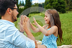 Father And Daughter Having Fun. Happy Dad Playing With Kid