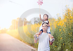 Father and daughter having fun and playing together