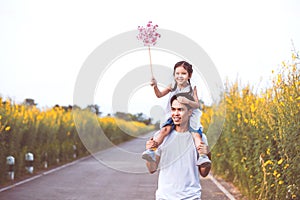 Father and daughter having fun and playing together