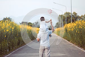 Father and daughter having fun to play together