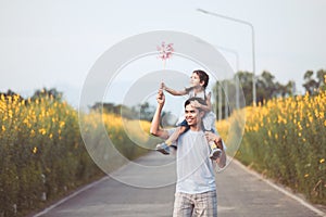 Father and daughter having fun to play together