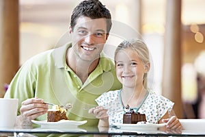 Father And Daughter Having Lunch Together