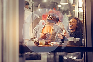 Father and daughter laughing out loud feeling happy together