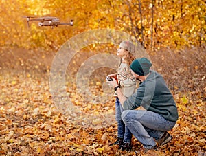 Father and daughter launch quadrocopter