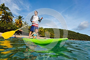 Father and daughter paddling