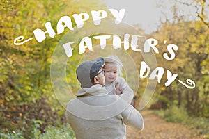 Father with daughter in park. Fathers day concept.