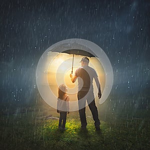 Father and Daughter in the Rain photo