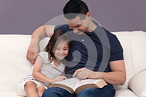 Father and Daughter Reading the Bible
