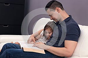 Father and Daughter Reading the Bible