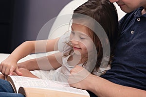 Father and Daughter Reading the Bible