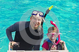 Father and Daughter Snorkeling in the Caribbean