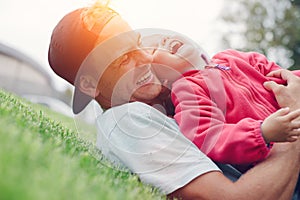 Father and daughter spending time in the park, happy family