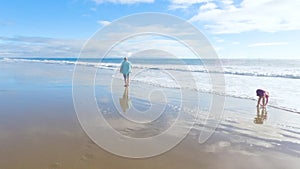 Father, Daughter Stroll El Capitan Beach, California