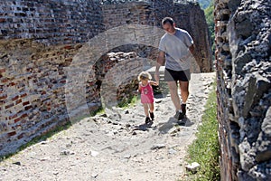 Father and daughter visiting a fortress