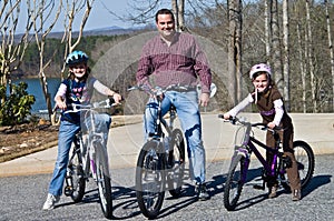 Father and Daughters Bike Riders photo