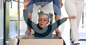 Father, girl and playing in box of new home for celebration or excited for real estate or relocation to property by