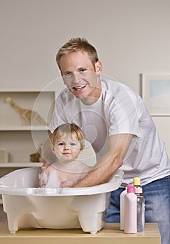 Father Giving Daughter a Bath