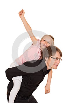 Father giving piggyback ride to his daughter