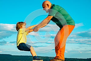 Father or Grandrahter criticizing his disobedient child for bad behavior. Cmauvais ton. hild-rearing practices.