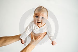 Father hands holding infant baby family lifestyle