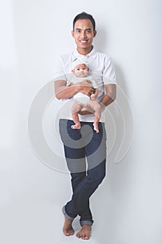 Father having fun with his baby