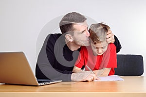 Father helping his son with homework