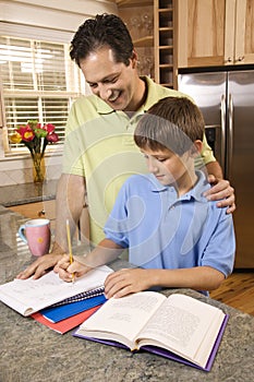 Father Helping Son with Homework