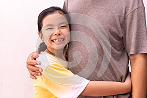 Father and his daughter child asian girl playing and hugging. Happy loving family. Concept of Father`s day