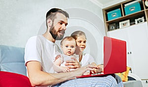 Father and his daughters at home