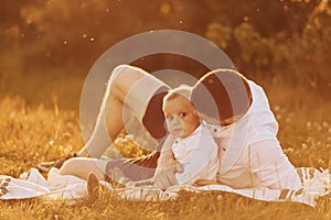 Father with his son spending free time outdoors at sunny day time of summer