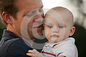 Father Holding Baby